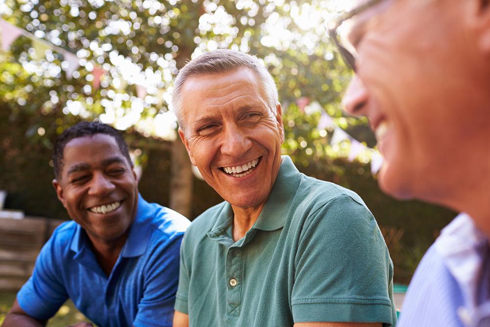 Why do men delay seeking advice about prostate cancer?